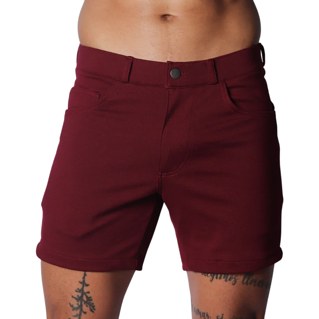 Wine-colored tailored shorts with a structured waistband, button closure, and classic five-pocket design.