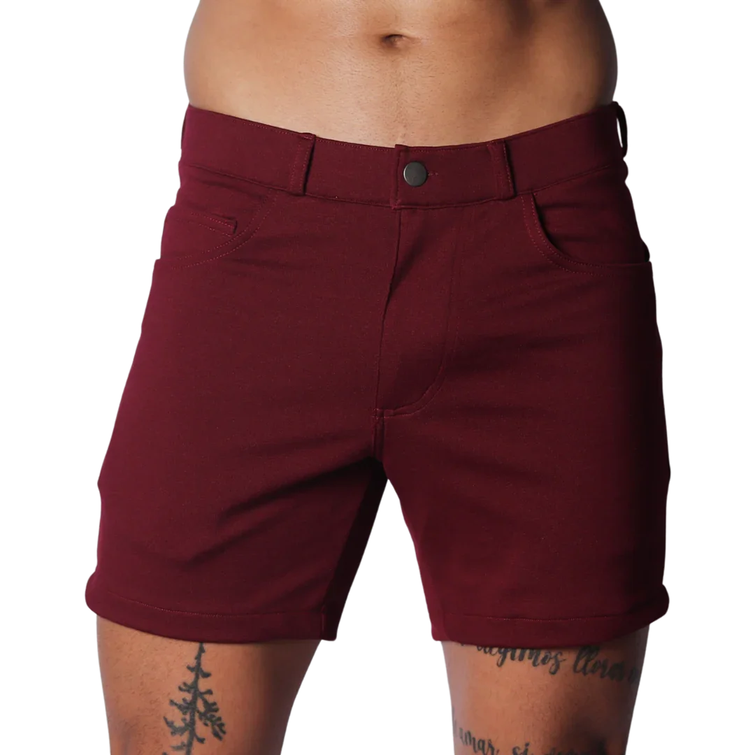 Wine-colored tailored shorts with a structured waistband, button closure, and classic five-pocket design.