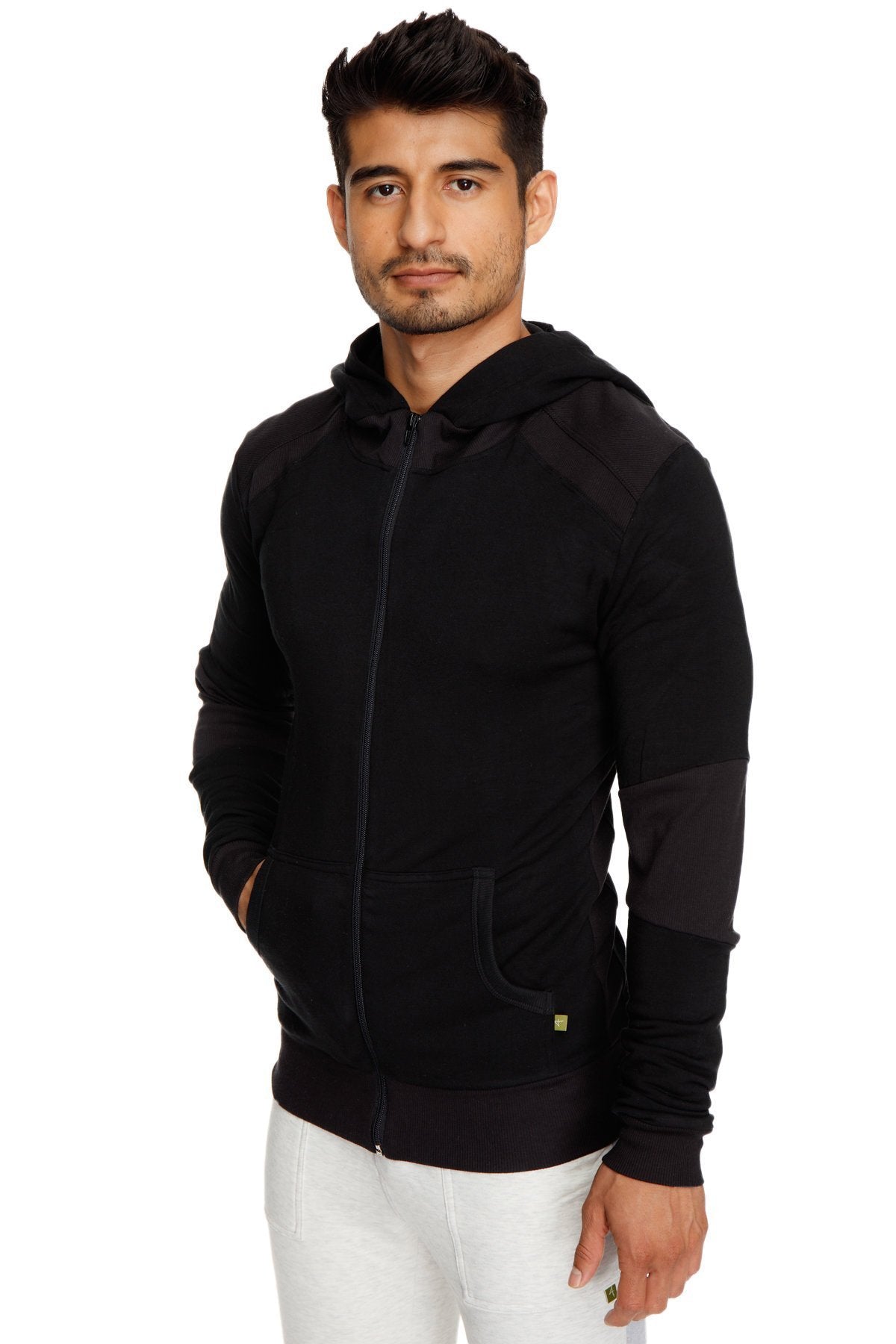 Black mid-weight luxury-fleece form-fit crossover yoga track hoodie with subtle contrast panels and green logo