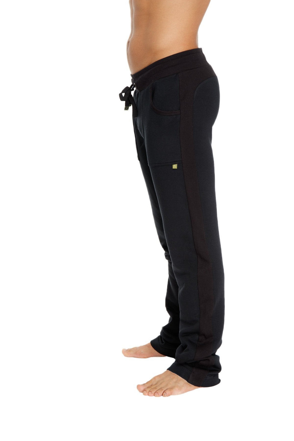 Black mid-weight luxury-fleece sweatpant with drawstring and lime green logo on thigh from winter collection