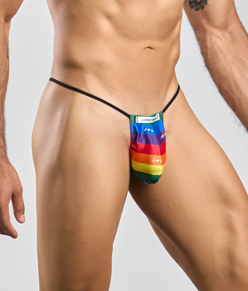 Justin Simon classic g-string bulge featuring a rainbow-striped fabric thong with black elastic waistband and brand label
