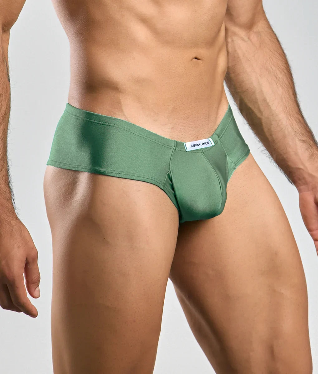 Green justin simon cheek briefs with white waistband label made from soft breathable fabric for everyday comfort