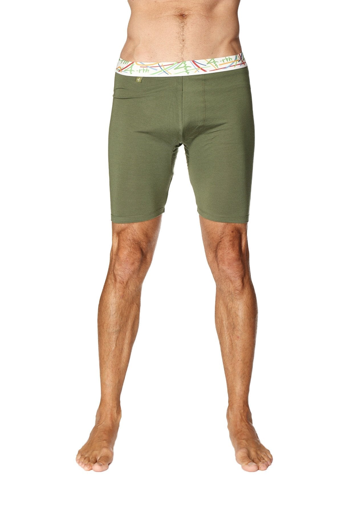 Olive green yoga compression shorts with white waistband and colorful abstract patterns perfect for athletic use