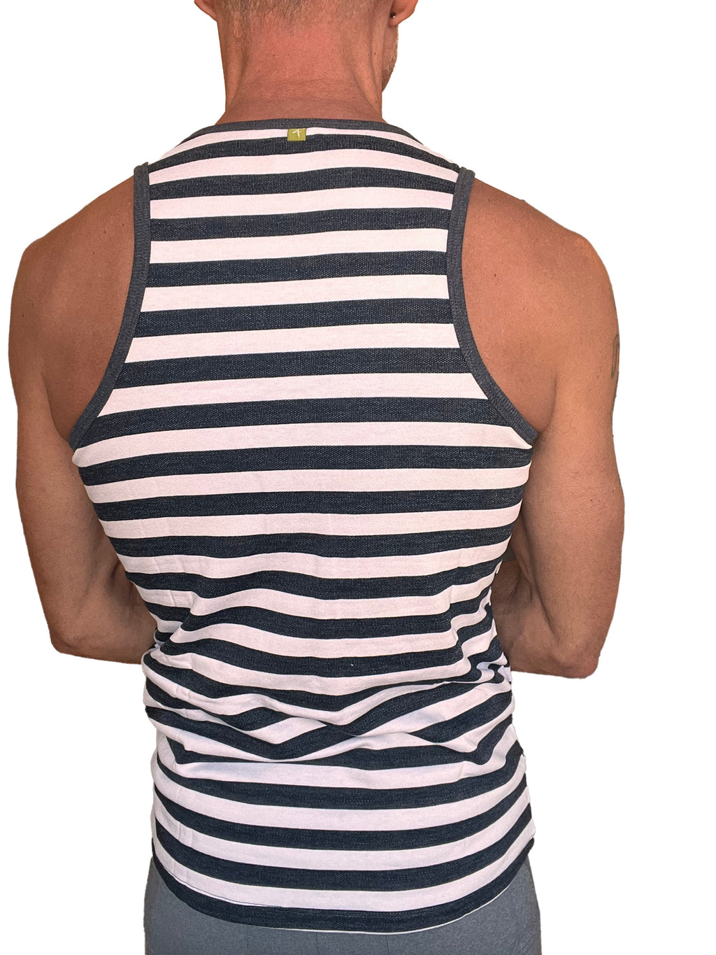 A men’s black and white striped fleece tank top with ribbed neckline and armholes for casual wear