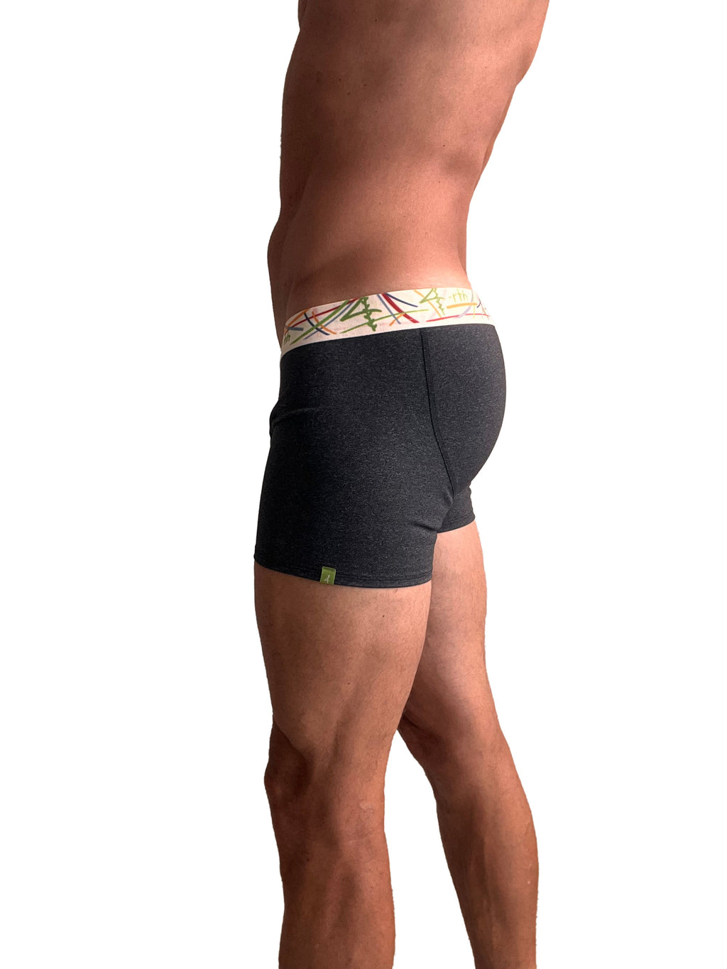 Black heathered zen boxer brief in charcoal grey with a green and red geometric patterned waistband