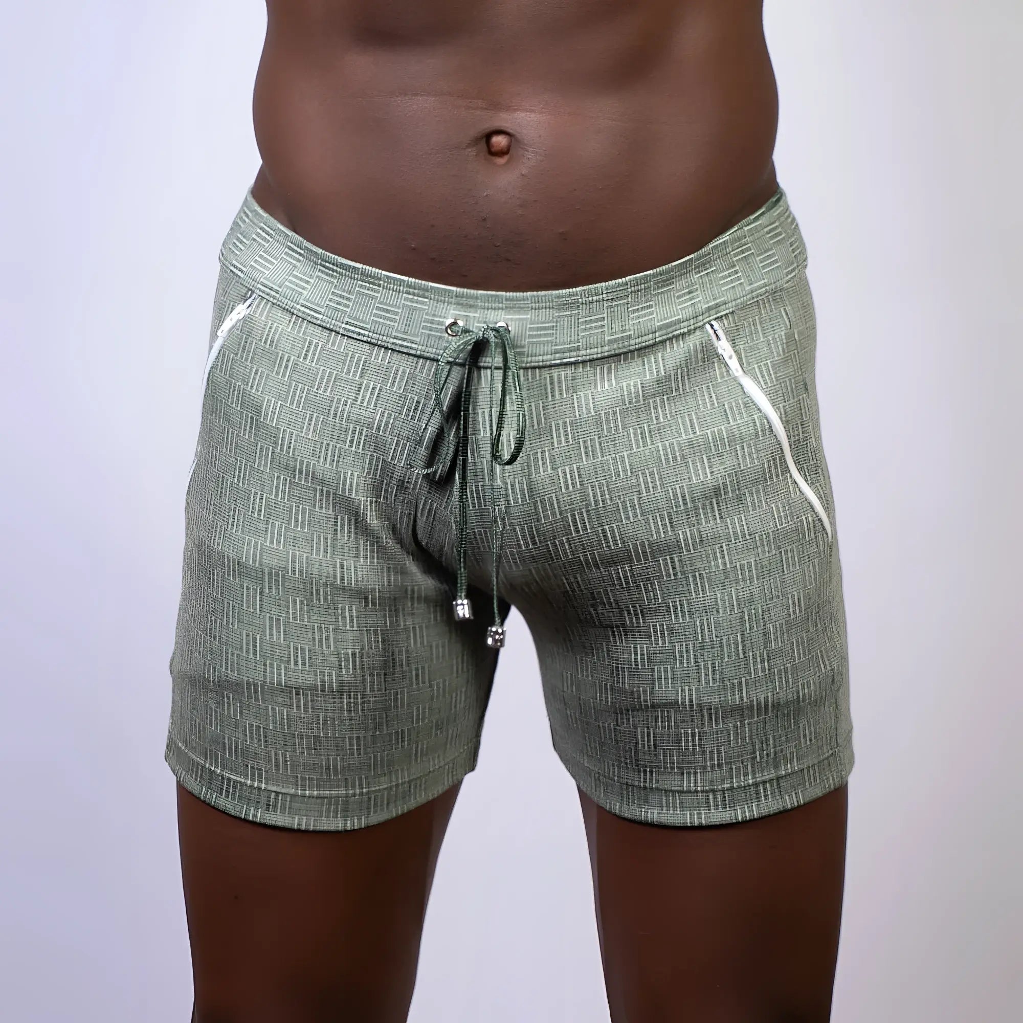 Abstract linen texture shorts in olive green with white zipper accents and a drawstring waistband in linen fabric