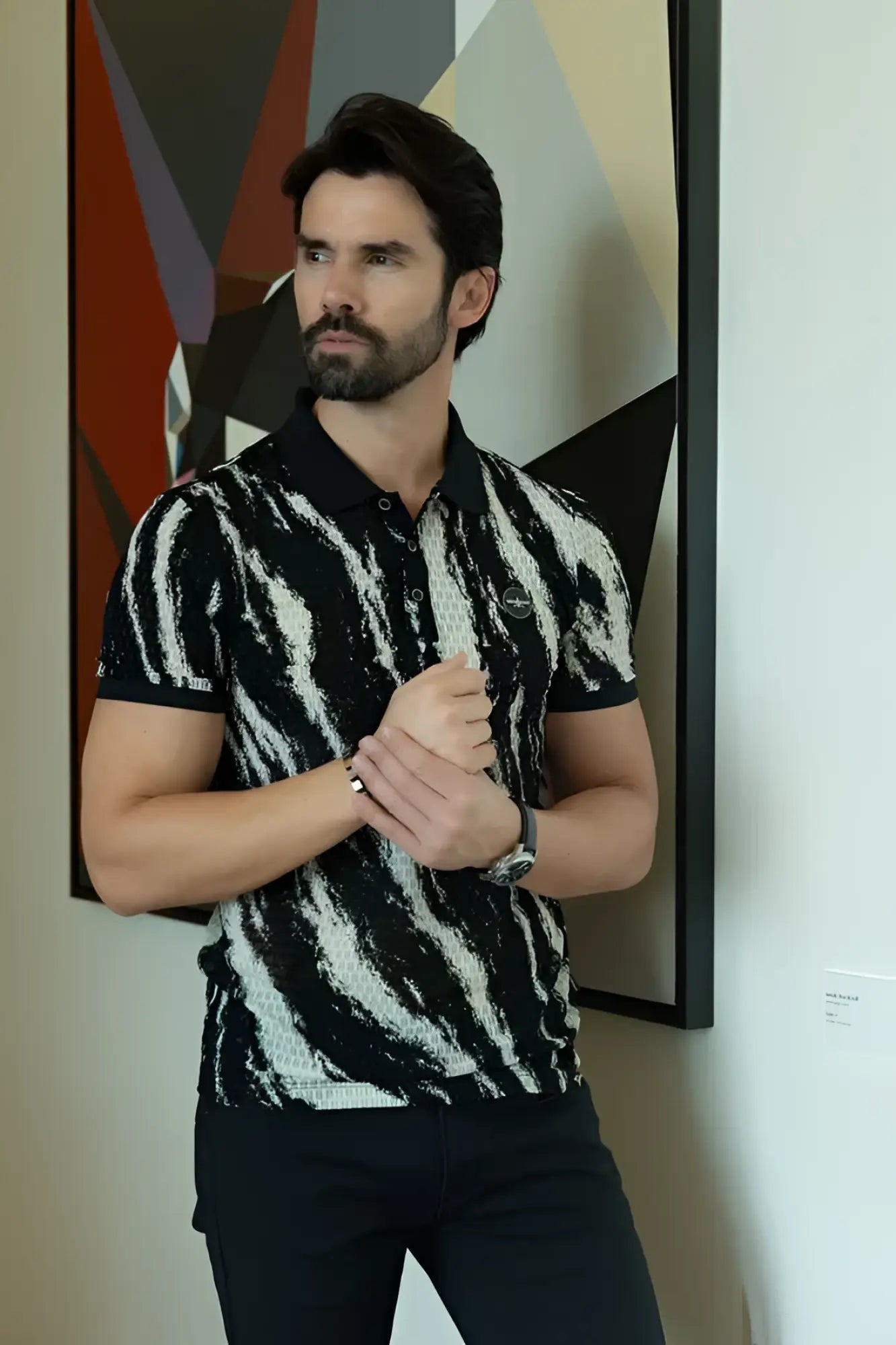Abstract polo shirt black and white zebra-striped short-sleeved with subtle textured pattern for casual wear