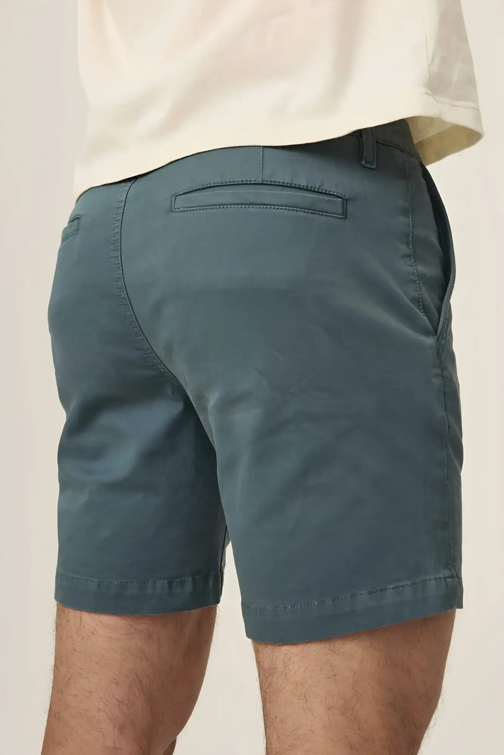 Dark teal act chino shorts with subtle texture and clean stitching in lightweight comfortable fabric