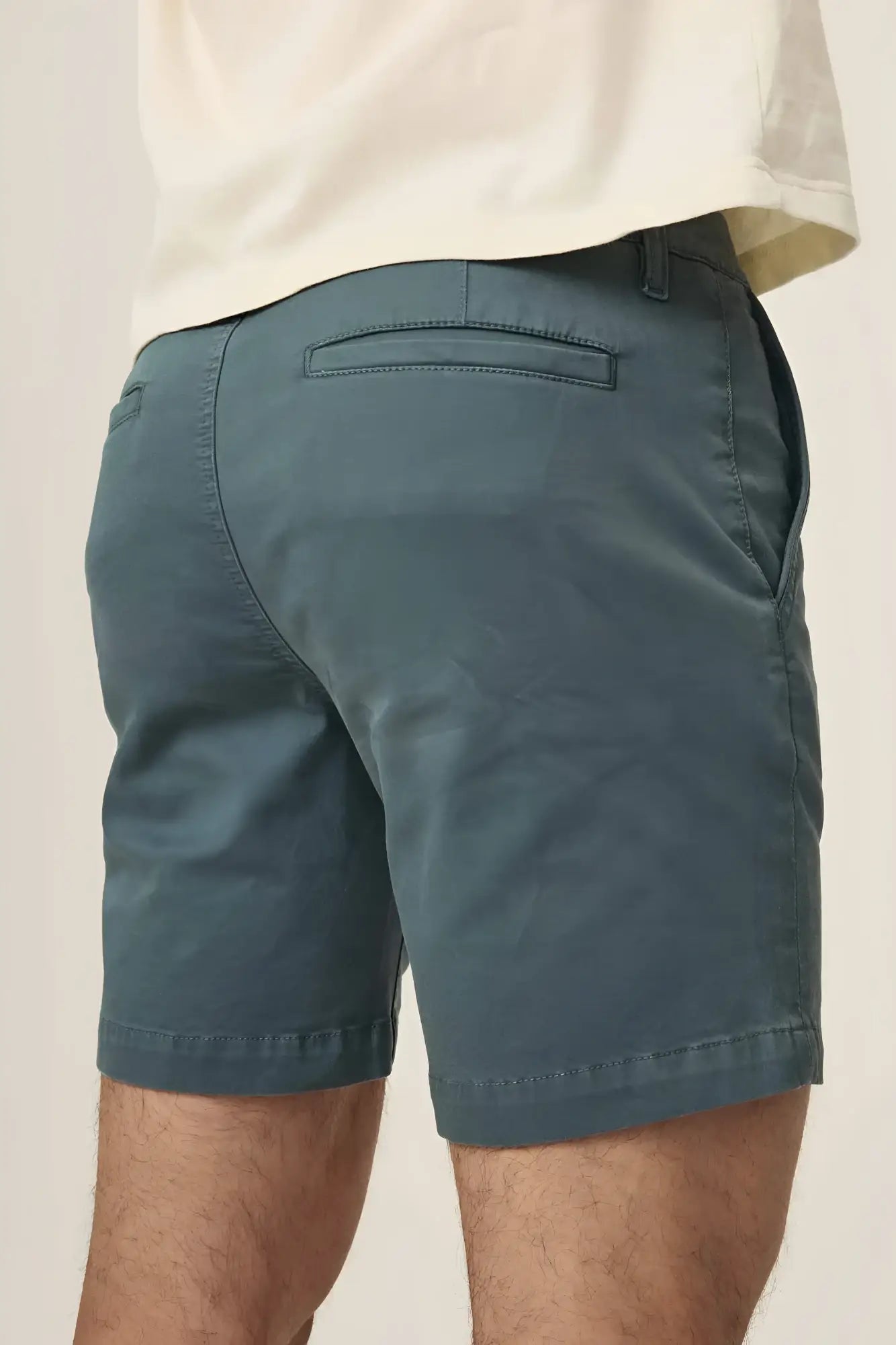 Dark teal act chino shorts with subtle texture and clean stitching in lightweight comfortable fabric