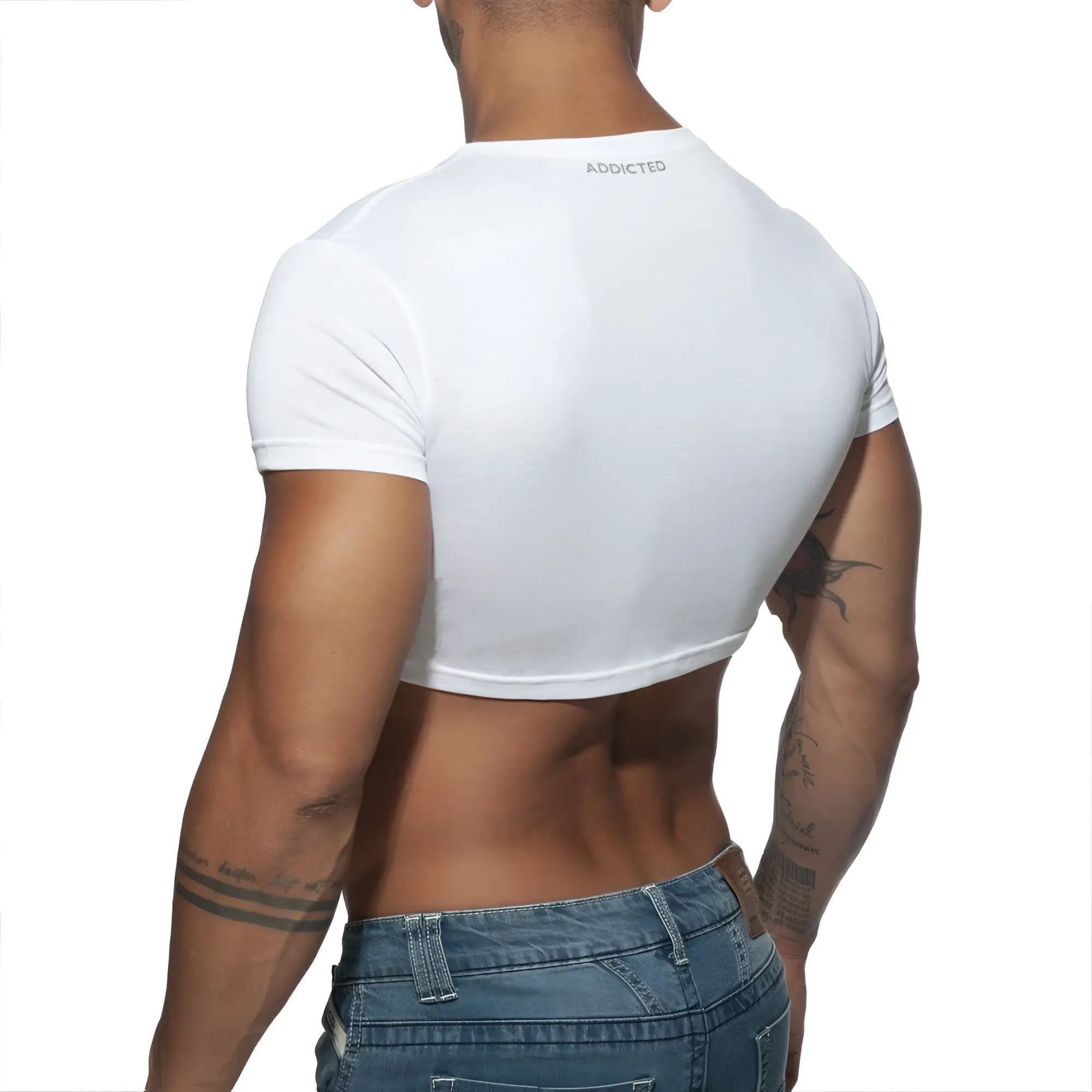 White cropped short sleeve t-shirt with addicted branding at the neckline from the ad crop top collection