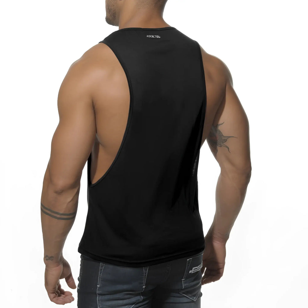 Black sleeveless tank top with a cutout back and adidted branding at the neckline shown from the back side