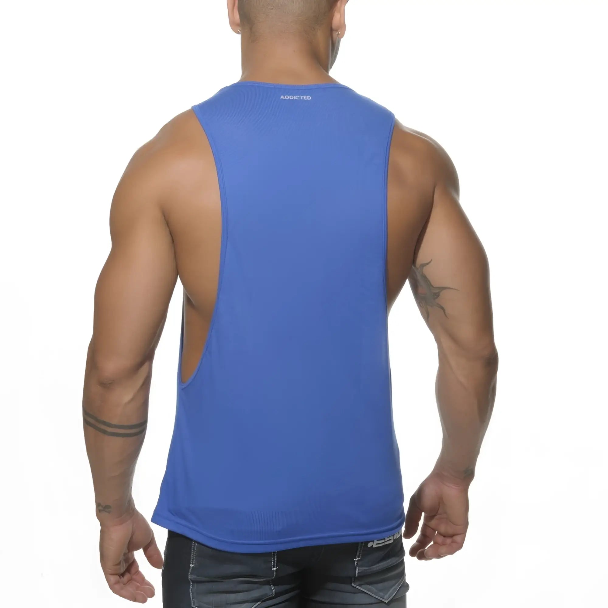 Blue sleeveless athletic tank top with back cutout and addicted branding at neckline ad logo low rider design