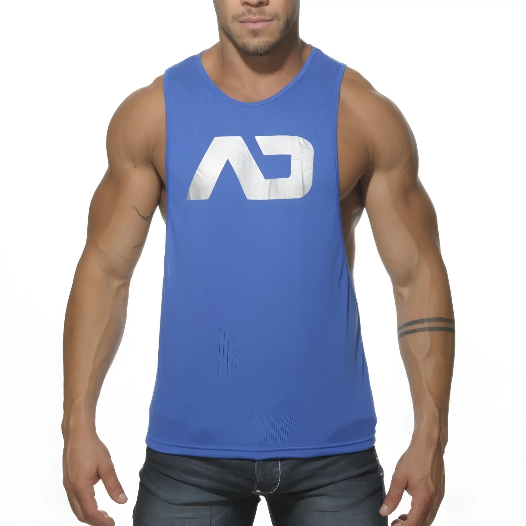 Blue sleeveless athletic tank top with white distressed logo on chest in ad logo low rider style