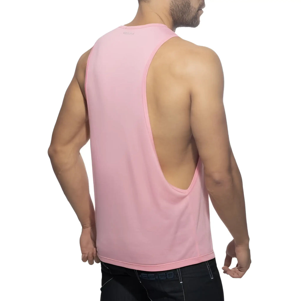 A pink sleeveless muscle tank top with a deep back cutout from the ad logo low rider collection