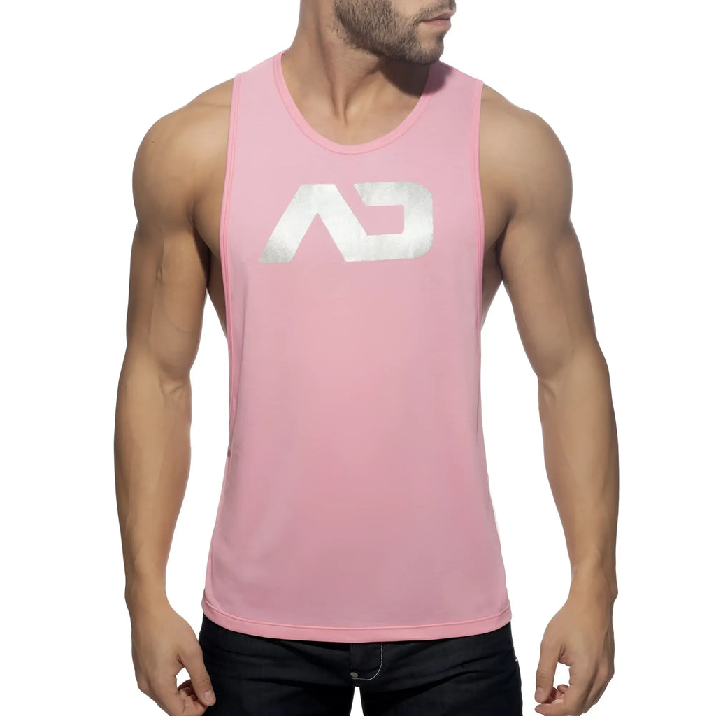 Pink sleeveless tank top with silver metallic ad logo on chest in ad logo low rider style