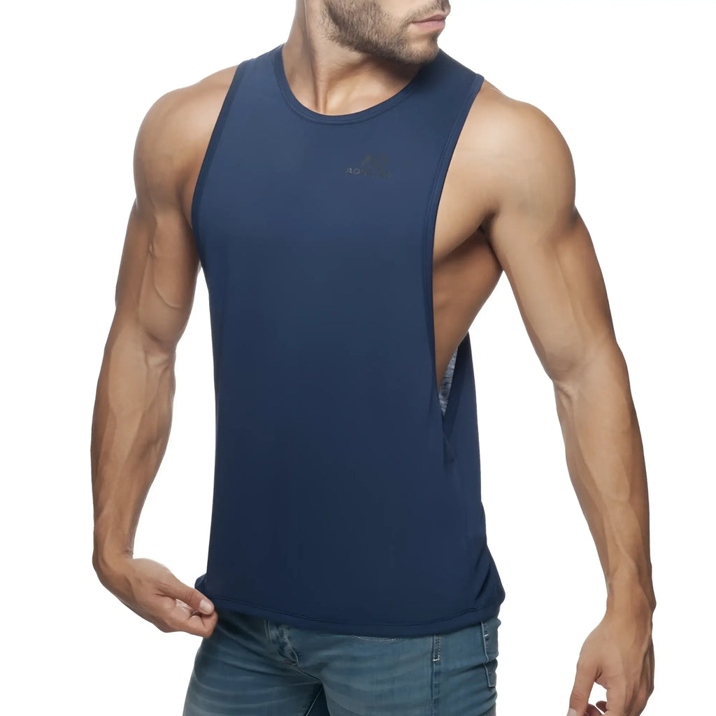 Navy blue sleeveless athletic tank top ad low rider with subtle chest logo and open back design for workouts