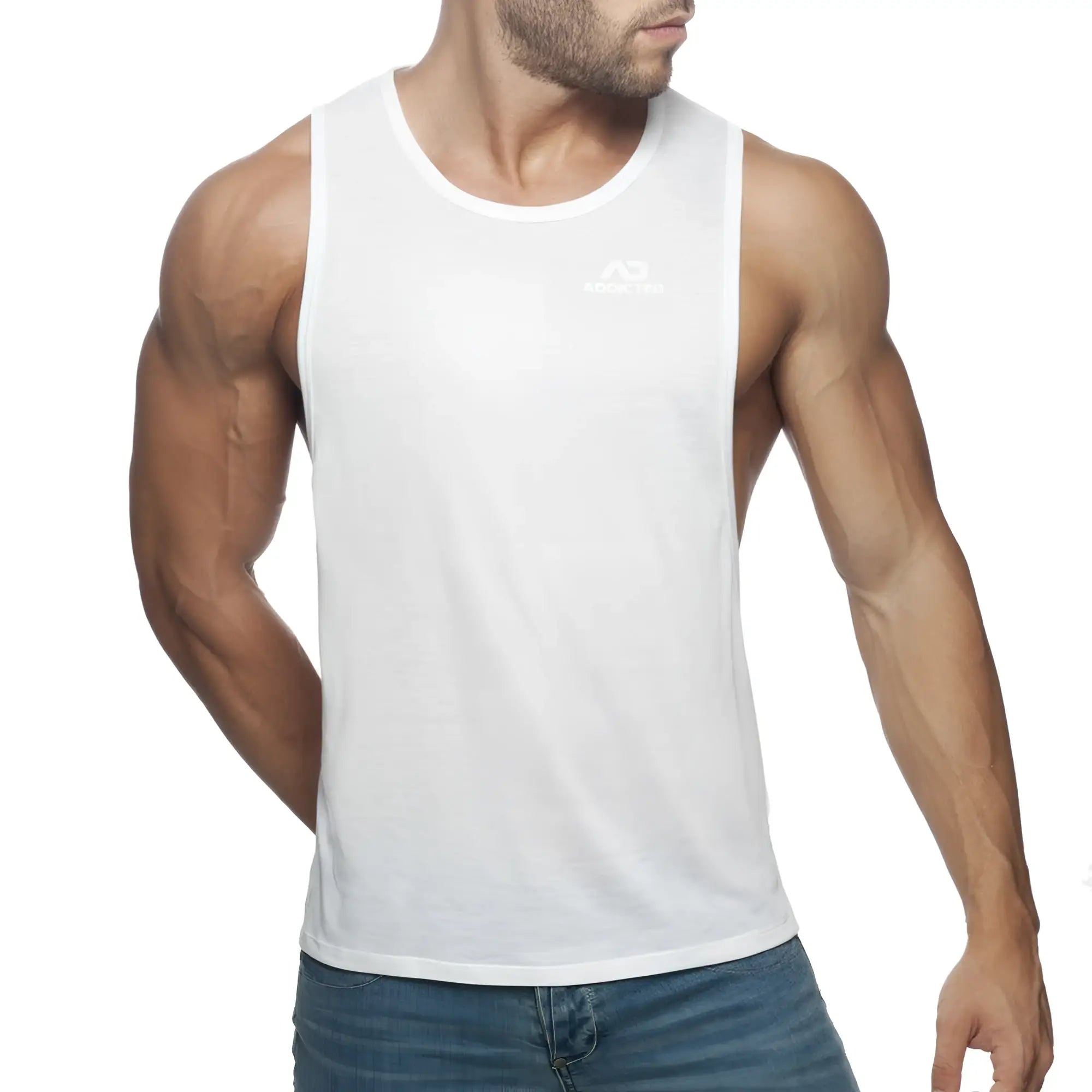 White sleeveless tank top ad low rider with small logo on chest made of lightweight breathable fabric