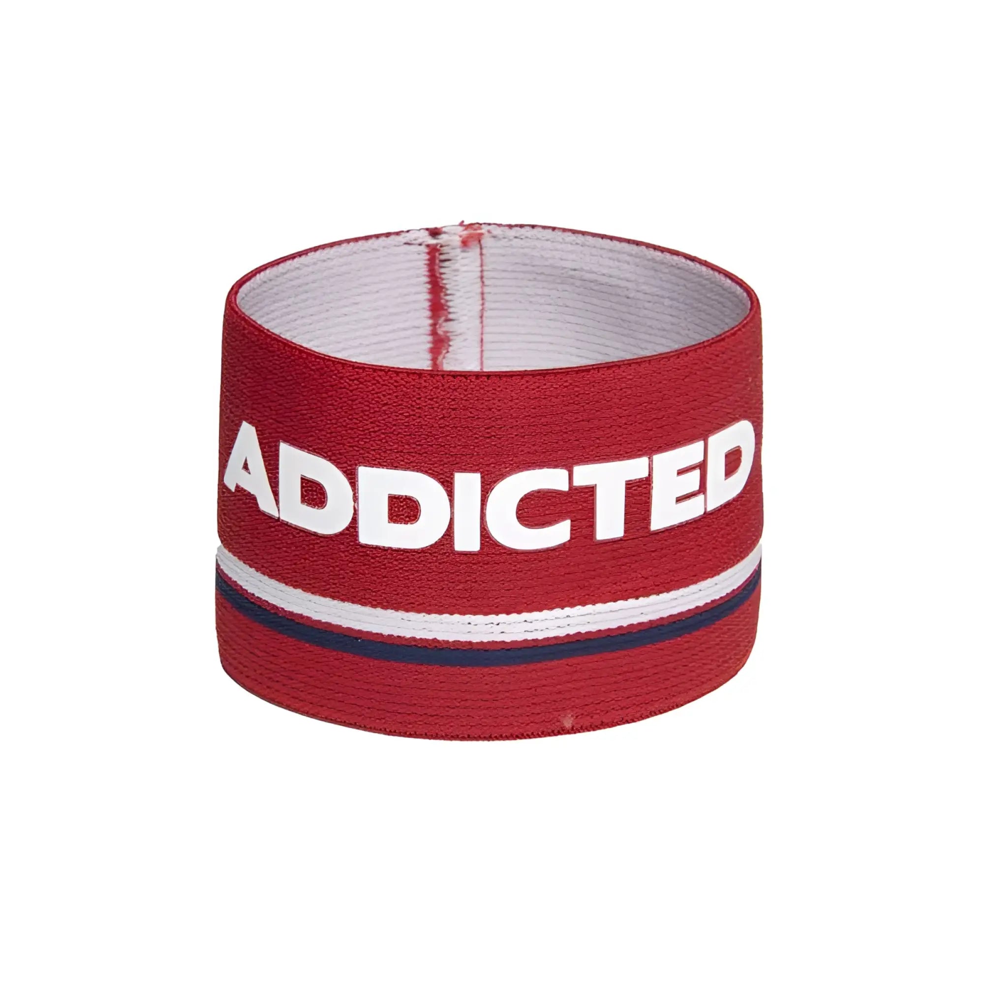 Red elastic bracelet with bold white addicted lettering and thin navy stripe on textured fabric surface size one size