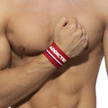 Red wristband bracelet with white and navy stripes featuring bold white addicted lettering in one size ac150