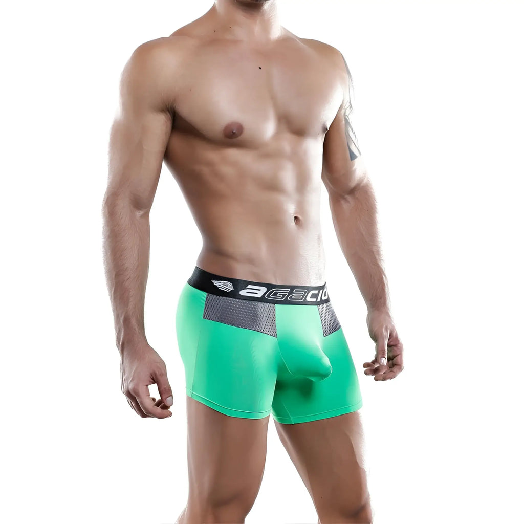 Bright green agacio AGG029 boxer trunk with black waistband logo and gray mesh panels for men