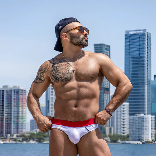 White swim trunks agacio agj039 brief with red waistband and black trim designed for swimwear use
