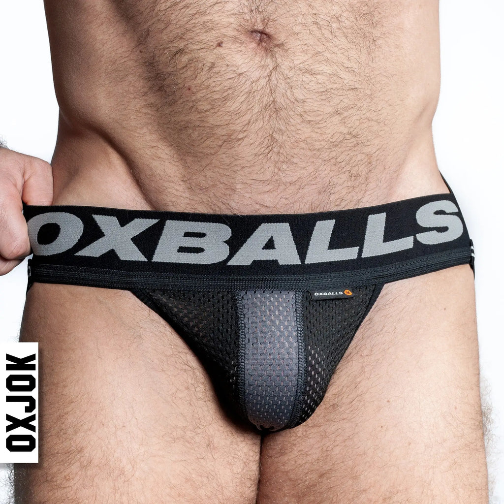 Black mesh airmesh jockstrap briefs with gray oxballs logo on waistband showcasing breathable material