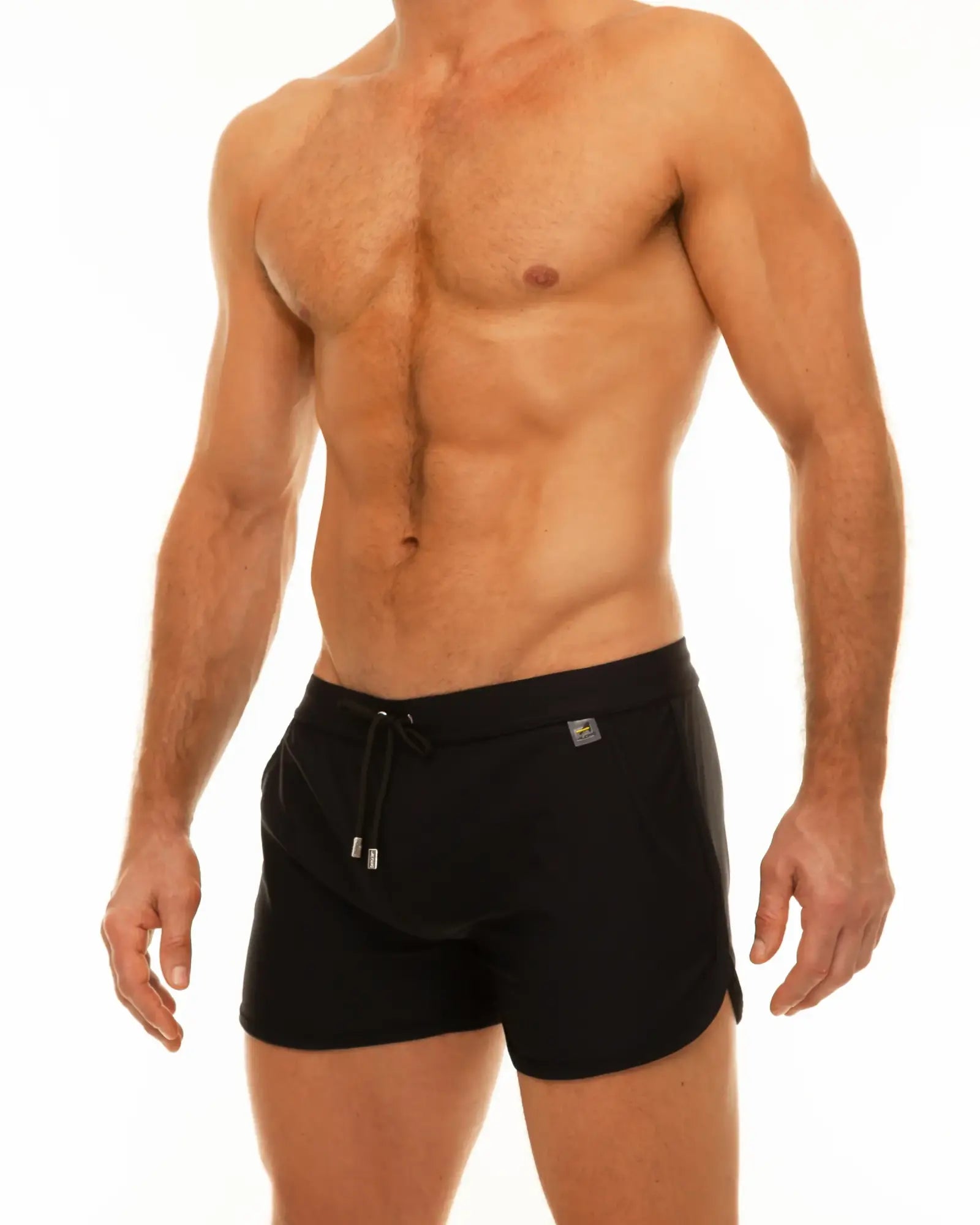 Black along slit swim shorts with drawstring waistband and small metallic logo on the side for beachwear