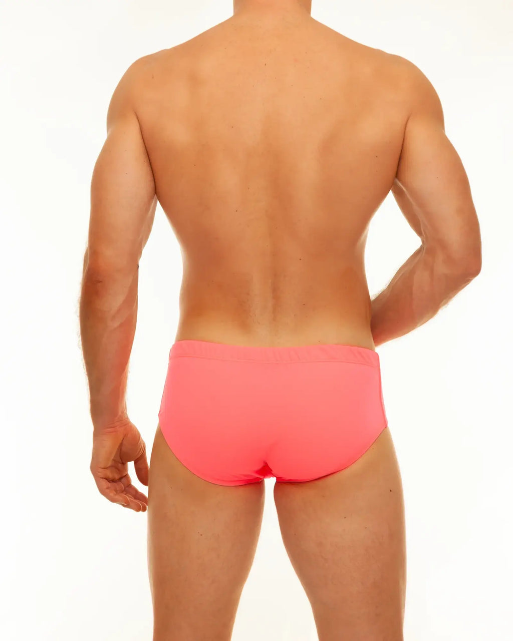 Bright pink along solid swim brief made of lightweight material for comfortable swimming use
