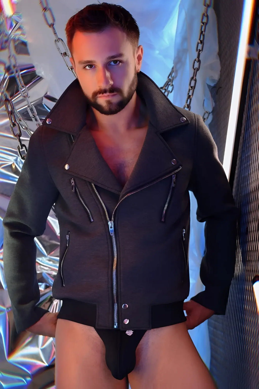 Alpha biker jacket is a black leather biker jacket with silver zippers and snap buttons for a classic edgy look