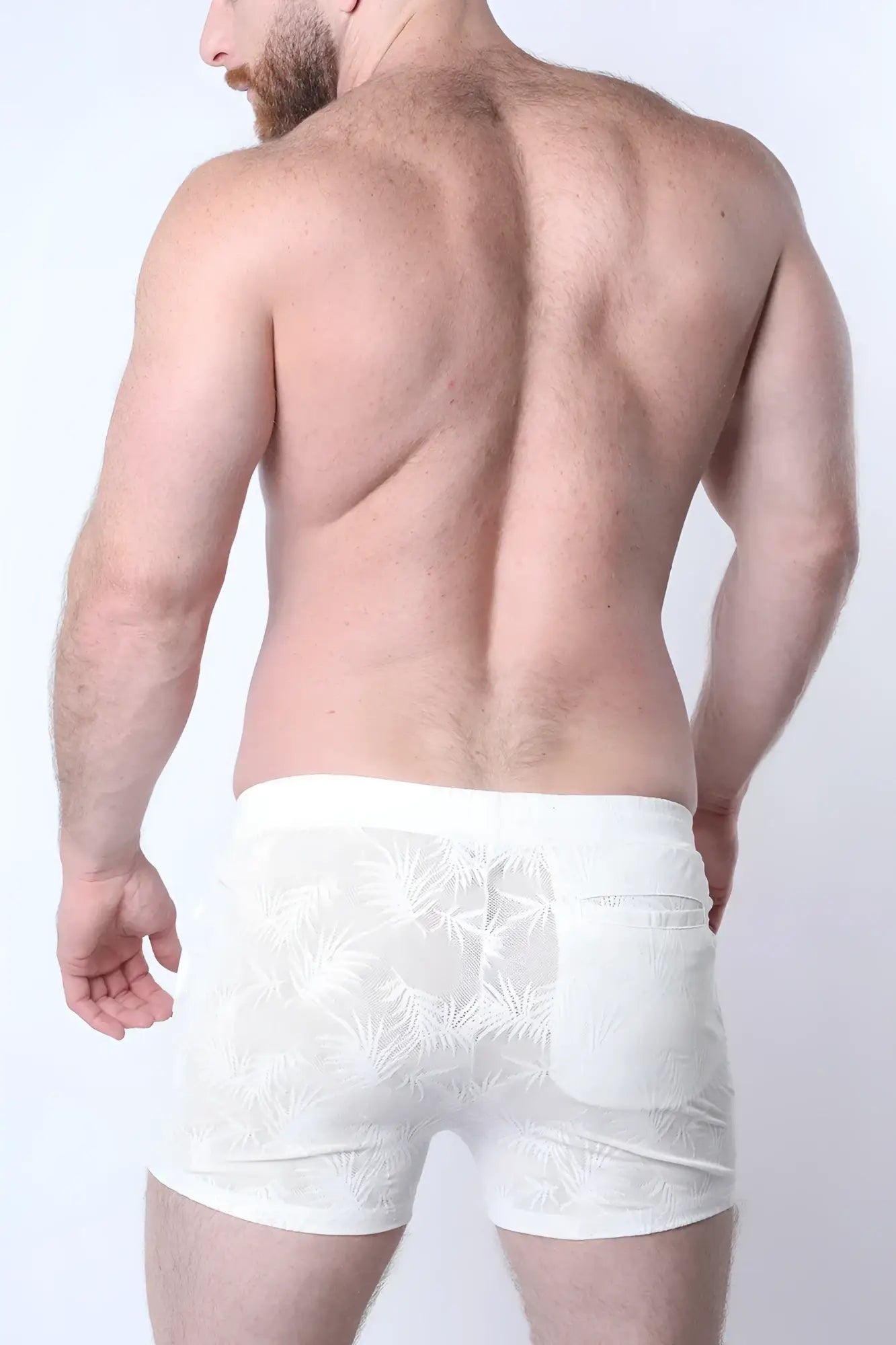 White tropical leaf-patterned mesh boxer briefs with side pocket from amalfi resort short collection