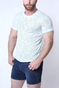 Light blue amalfi t-shirt with tropical leaf pattern made of breathable mesh fabric perfect for casual wear