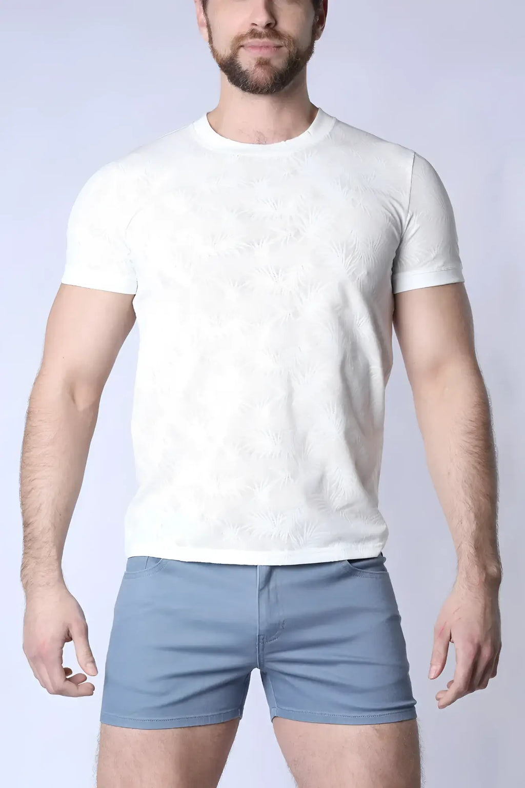 White textured amalfi t-shirt with short sleeves and a subtle floral pattern perfect for casual wear
