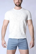 White textured amalfi t-shirt with short sleeves and a subtle floral pattern perfect for casual wear