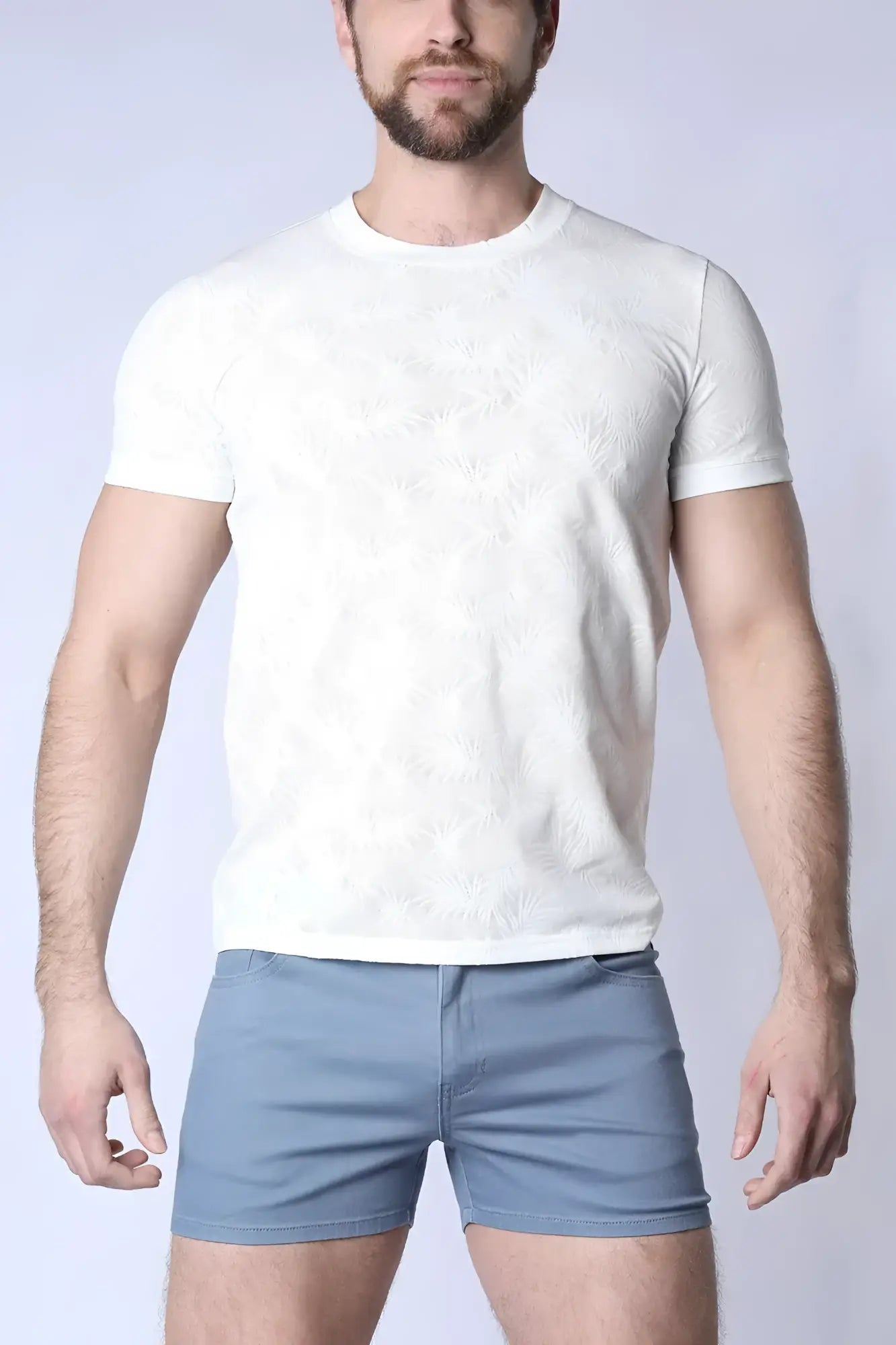 White textured amalfi t-shirt with short sleeves and a subtle floral pattern perfect for casual wear