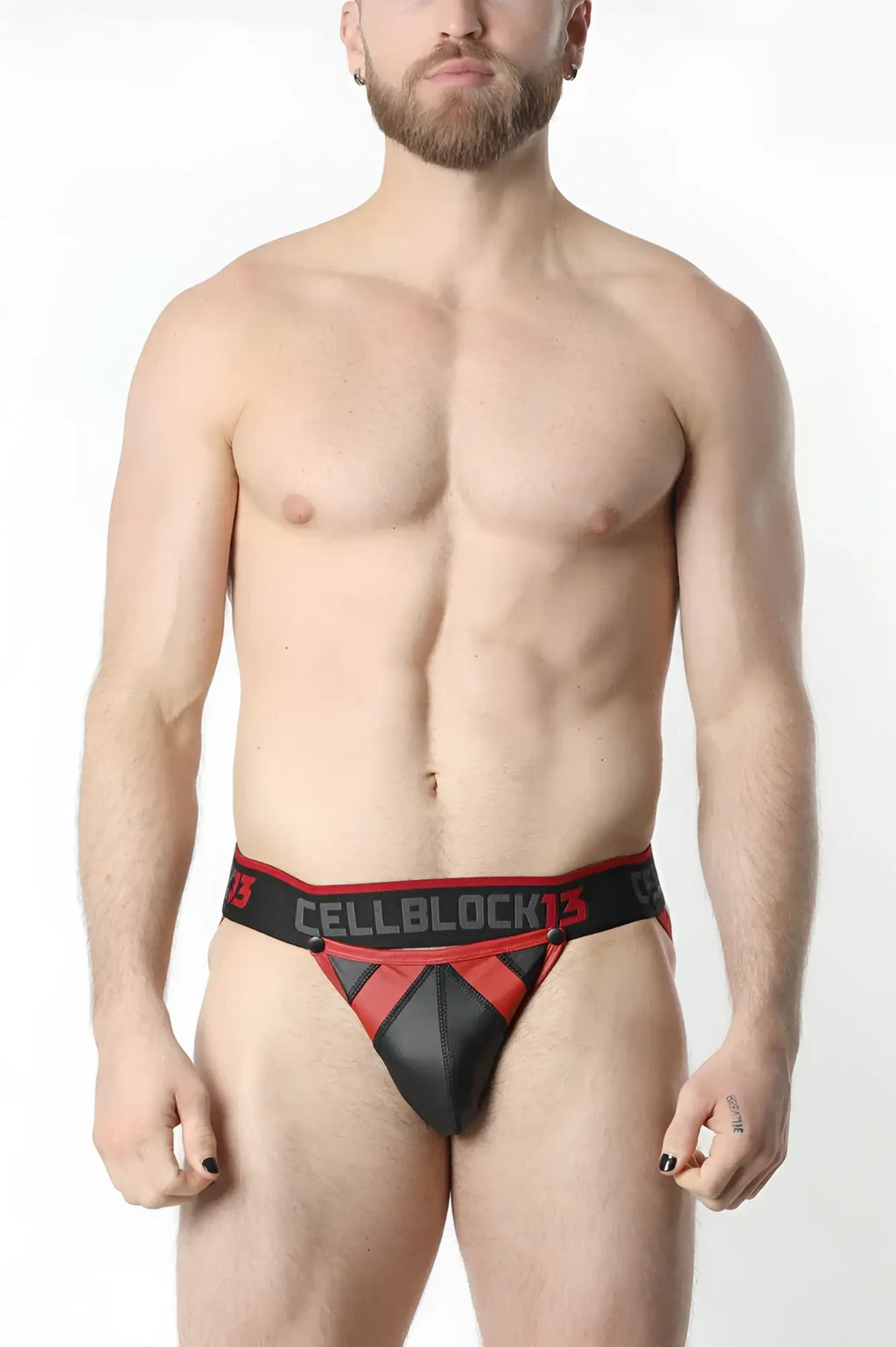 Black and red cellblock13 thong with bold geometric design featured in anti-chrome snap up jockstrap product