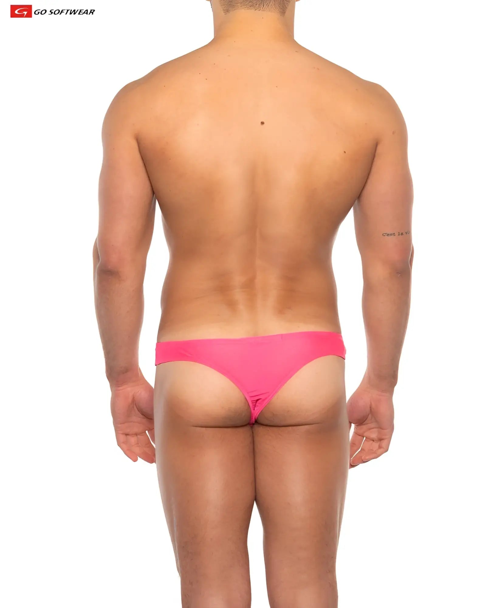 Bright pink form-fitting briefs made by go softwear designed as the apollo swim thong for swimwear use