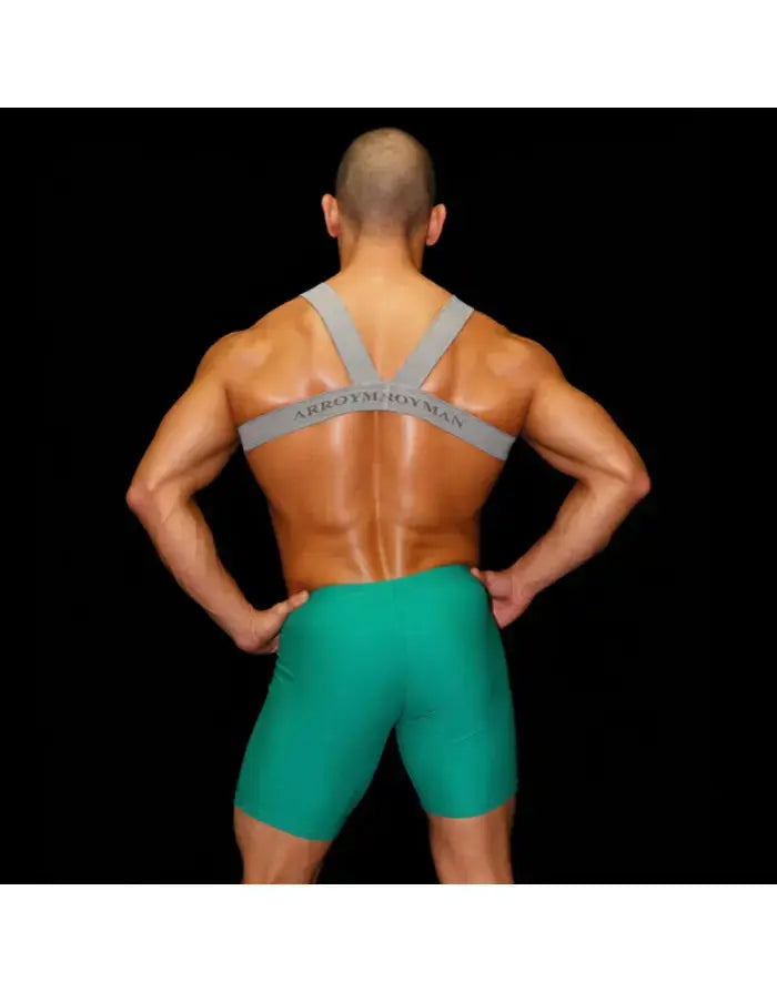 Men's grey body chest harness by Arroyman featuring wide straps and a snug fit worn over green shorts.