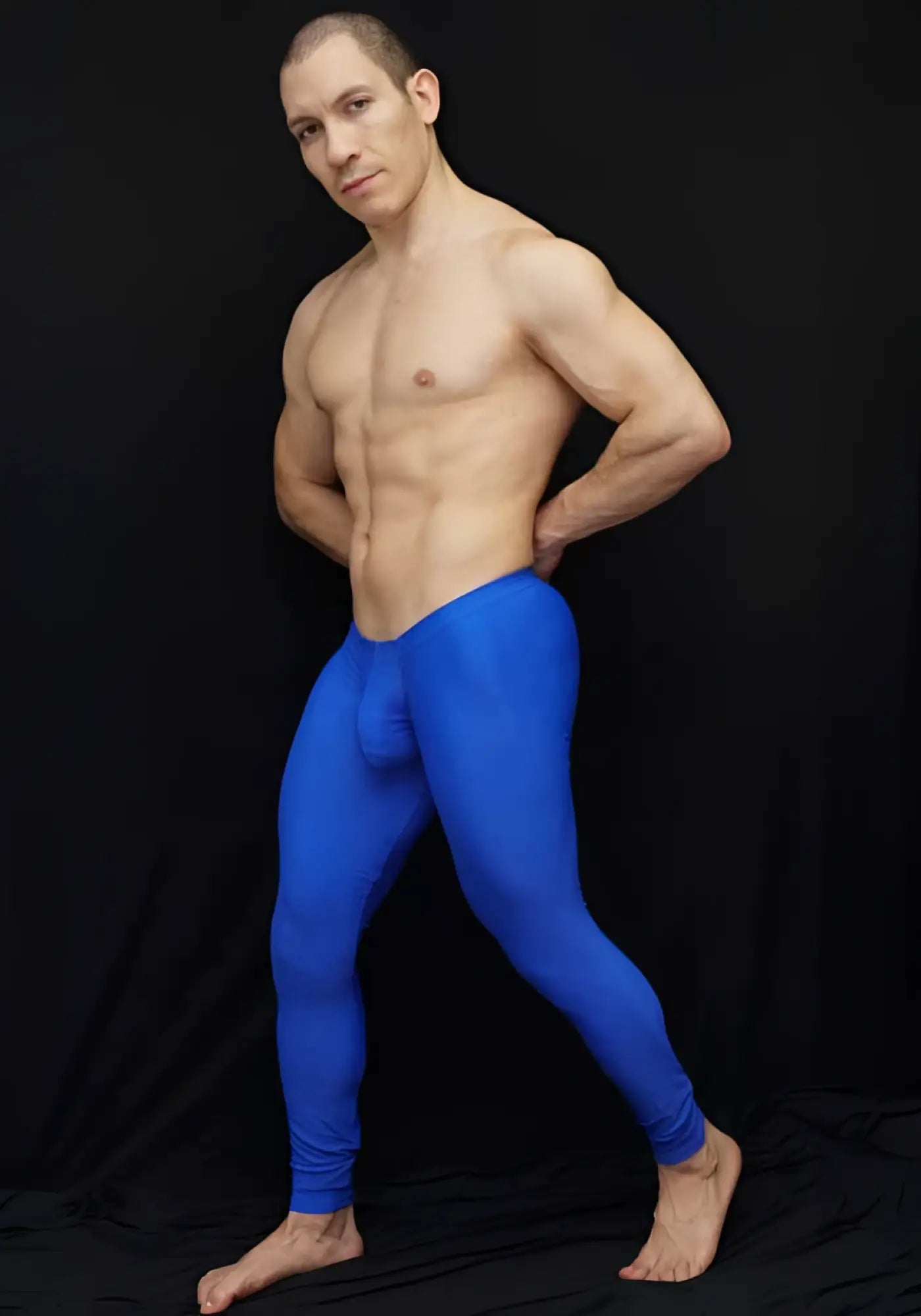 Bright blue form-fitting arroyman bulge runner pants made for athletic use in size medium