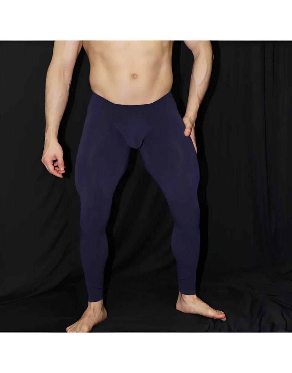 Navy blue form-fitting arroyman bulge runner leggings designed for running and activewear use