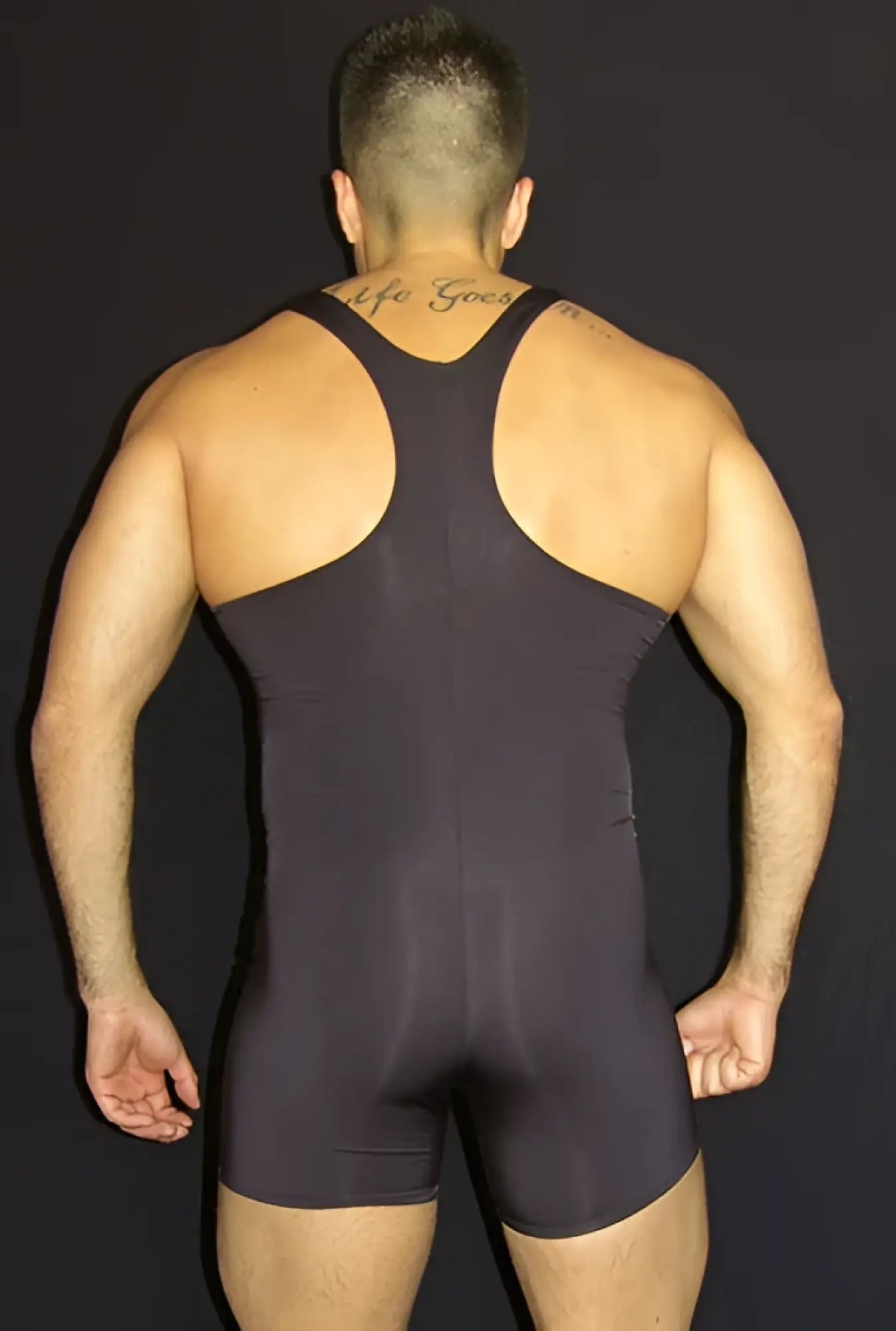 Black form-fitting arroyman string bodysuit by02 size l with racerback design shown from the back side