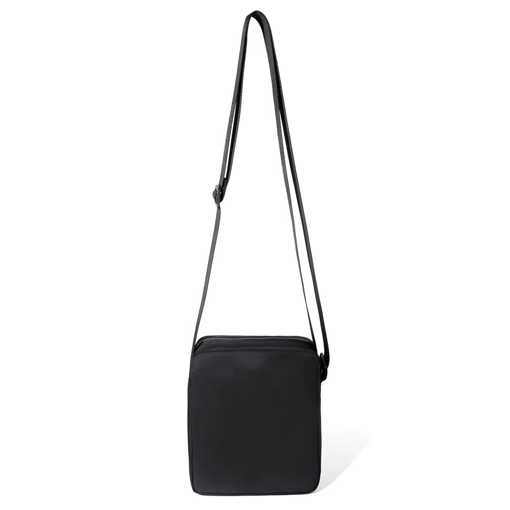 Black rectangular athletic crossbody bag with matching adjustable strap for hands free carrying