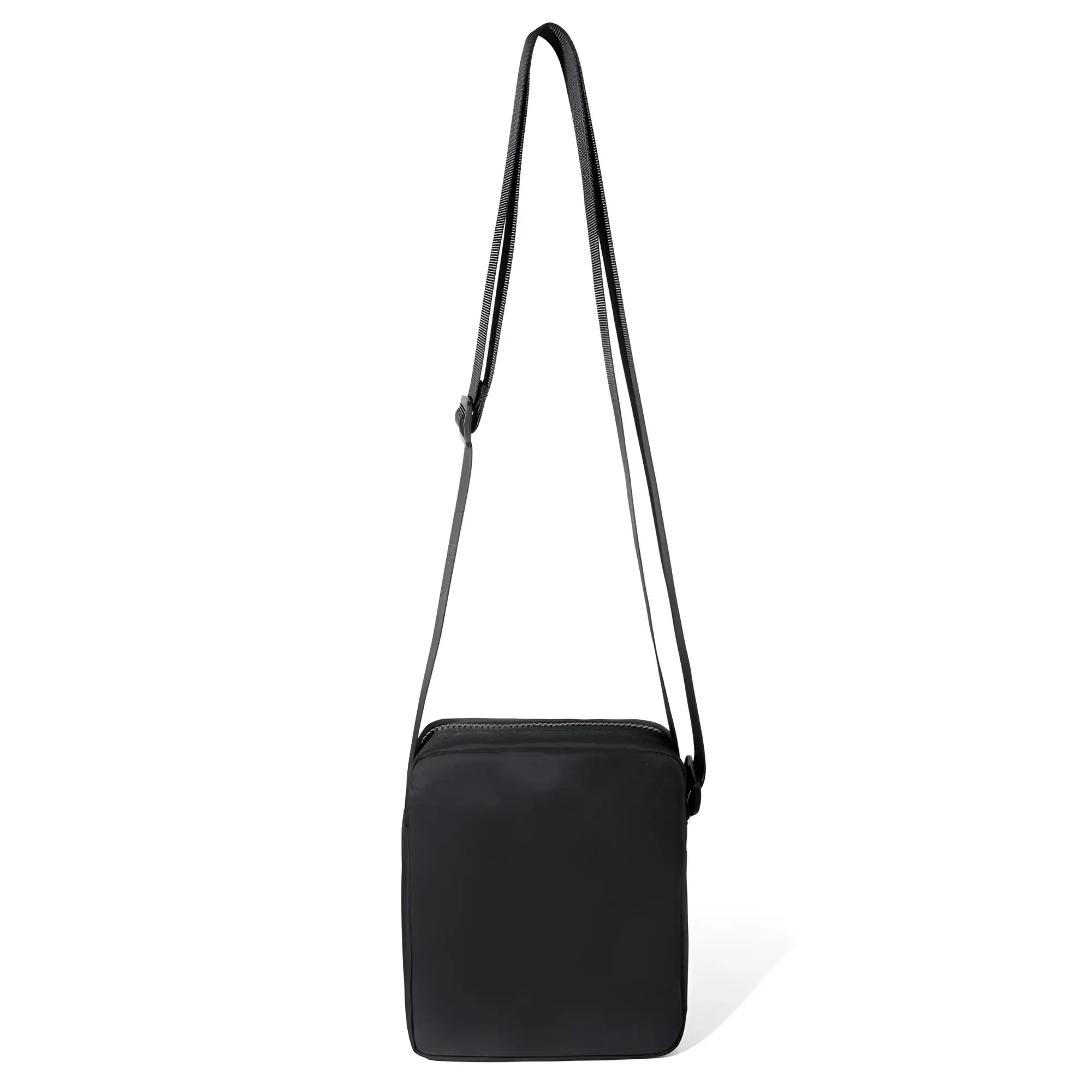 Black rectangular athletic crossbody bag with matching adjustable strap for hands free carrying