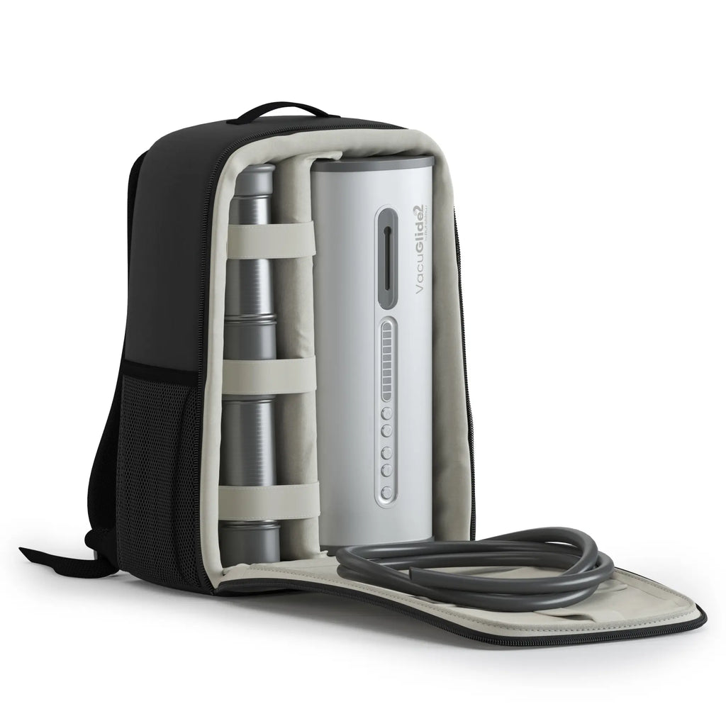 Autoblow VacuGlide 2 milking machine in a black storage backpack with internal organizers and accessories.