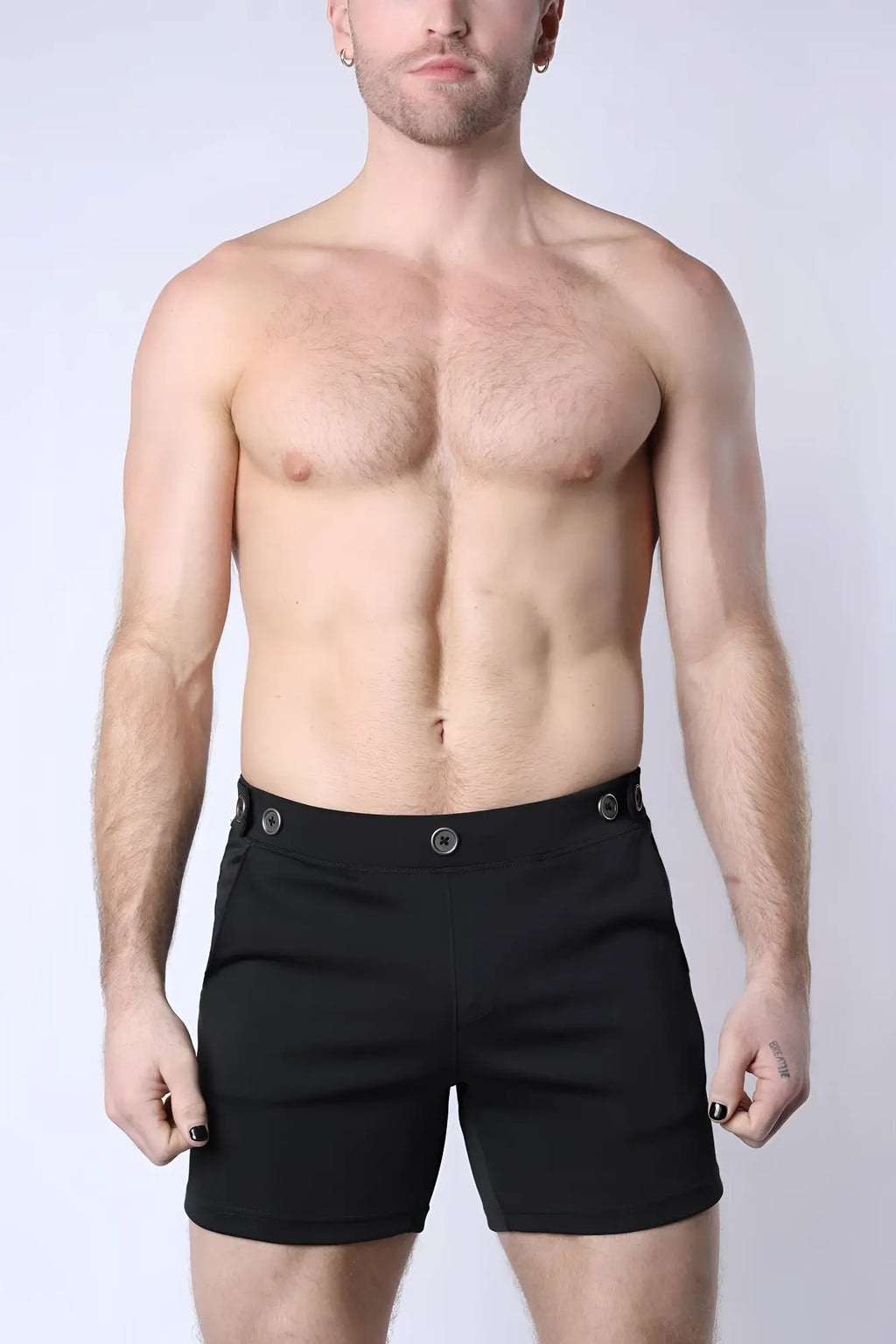 Black balboa hybrid swim short with sleek modern design and silver-toned button closures for versatile wear