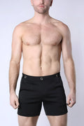Black balboa hybrid swim short with sleek modern design and silver-toned button closures for versatile wear