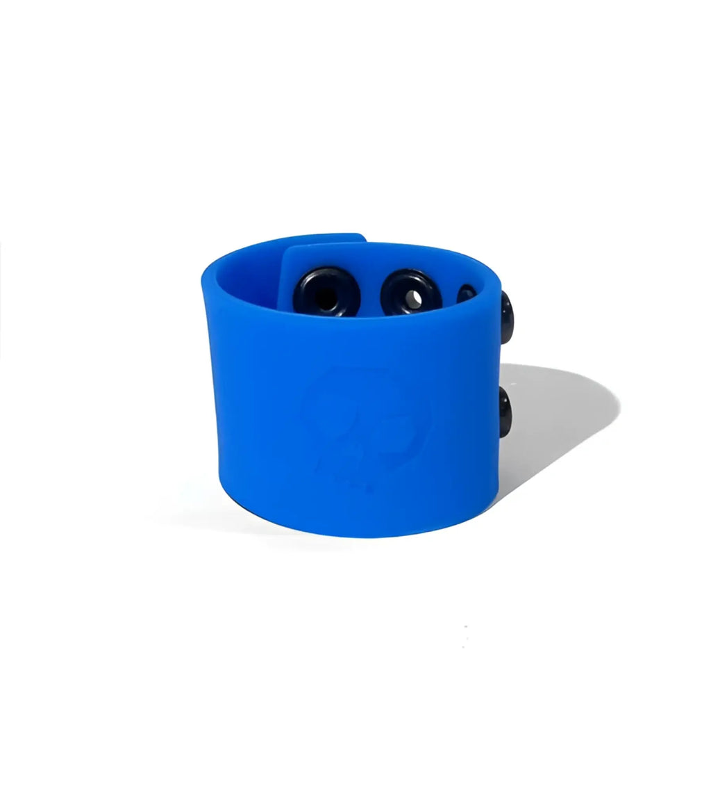 Blue silicone wristband ball strap with black snap buttons and subtle embossed skull design