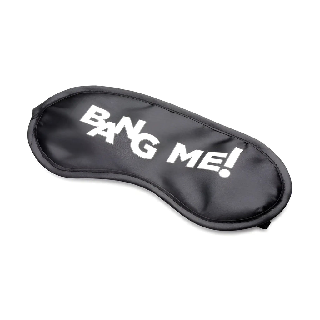 Black satin sleep mask with white "BANG ME!" text, included with the Bang Duo Blast remote control vibration kit.