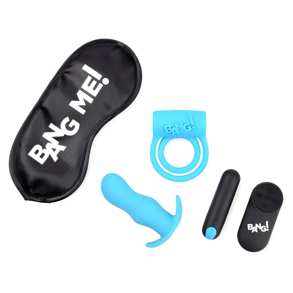Bang Duo Blast kit: blue silicone cock ring, butt plug, bullet vibrator, black remote, and "BANG ME!" silk sleep mask.