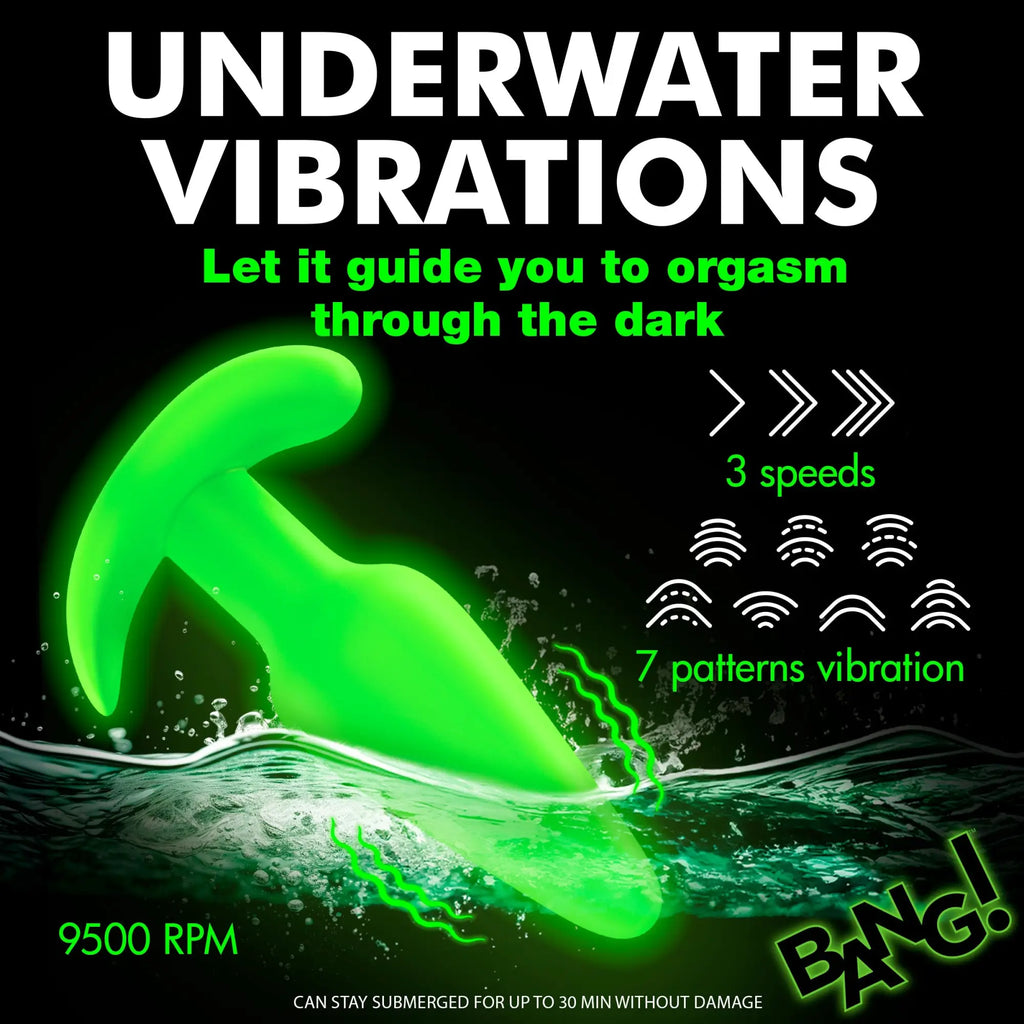 Bang Glow-in-the-Dark Silicone Butt Plug: A bright green, vibrating plug shown partially submerged in water.