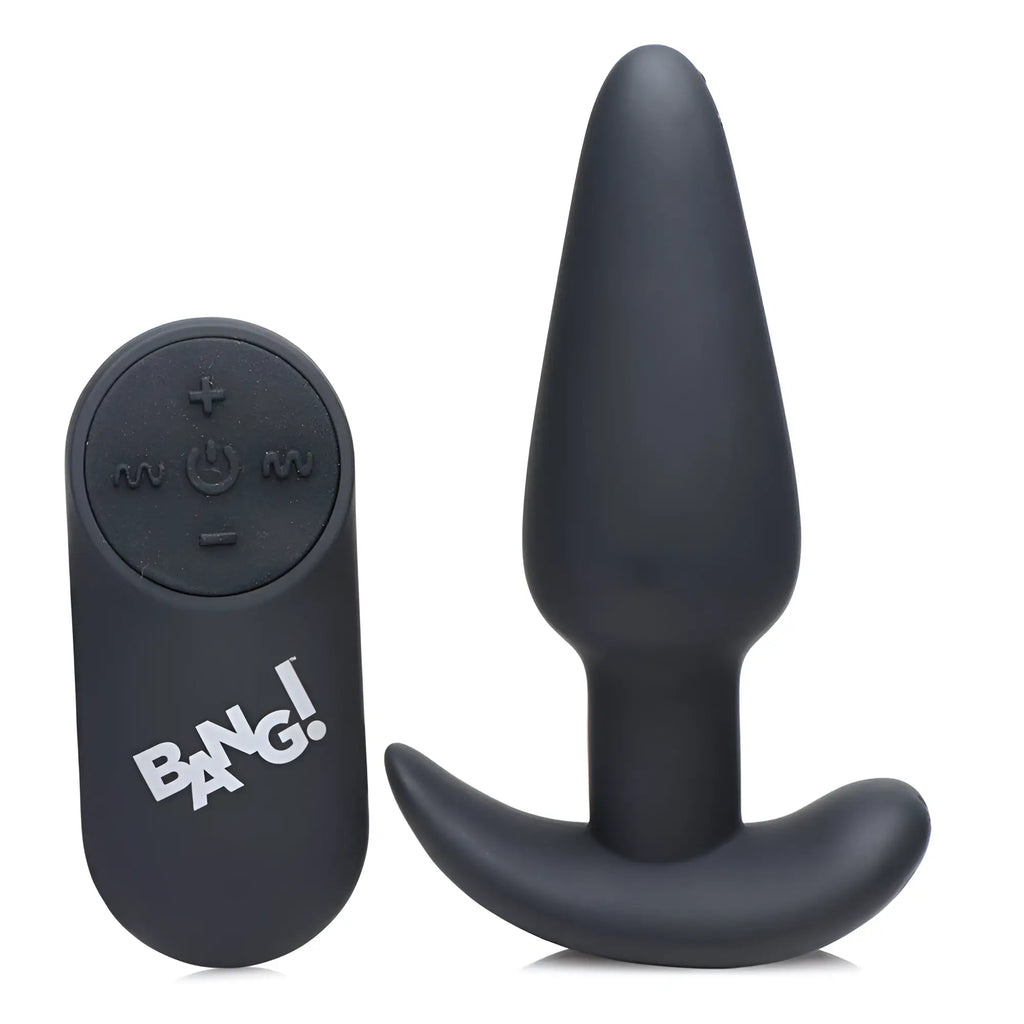 Bang Remote Control 21X: A matte black silicone vibrating butt plug and matching remote control on a white background.